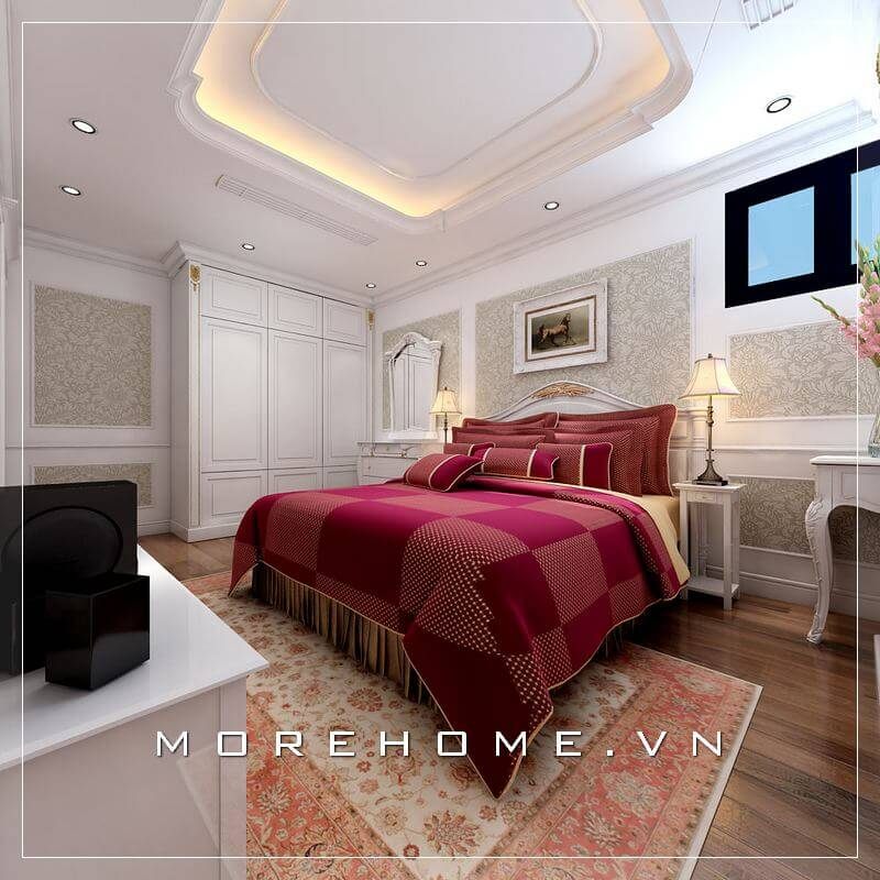 Bố trí nội thất phòng ngủ chung cư tiện nghi và khoa học, chiếc giường ngủ màu trắng chủ đạo kết hợp chăn đệm màu đỏ tạo điểm nhấn cho căn phòng không quá đơn điệu, tẻ nhạt